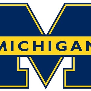 May include: A blue and yellow logo with the letter "M" in a bold, blocky font. The word "MICHIGAN" is written in yellow below the letter.