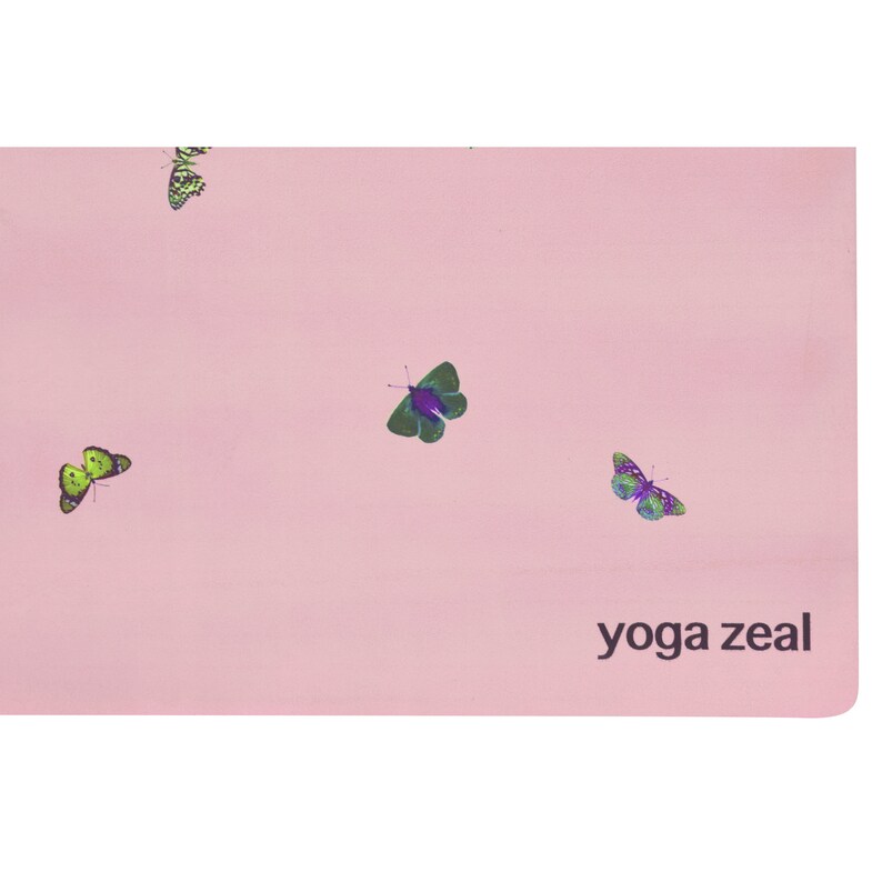 May include: Pink yoga mat with a butterfly pattern and the text "yoga zeal" printed on the bottom right corner.