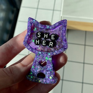 SHE/HER Purple Glitter Cat Candy Machine Resin Pin, Handmade Pronoun Brooch, Stern Face
