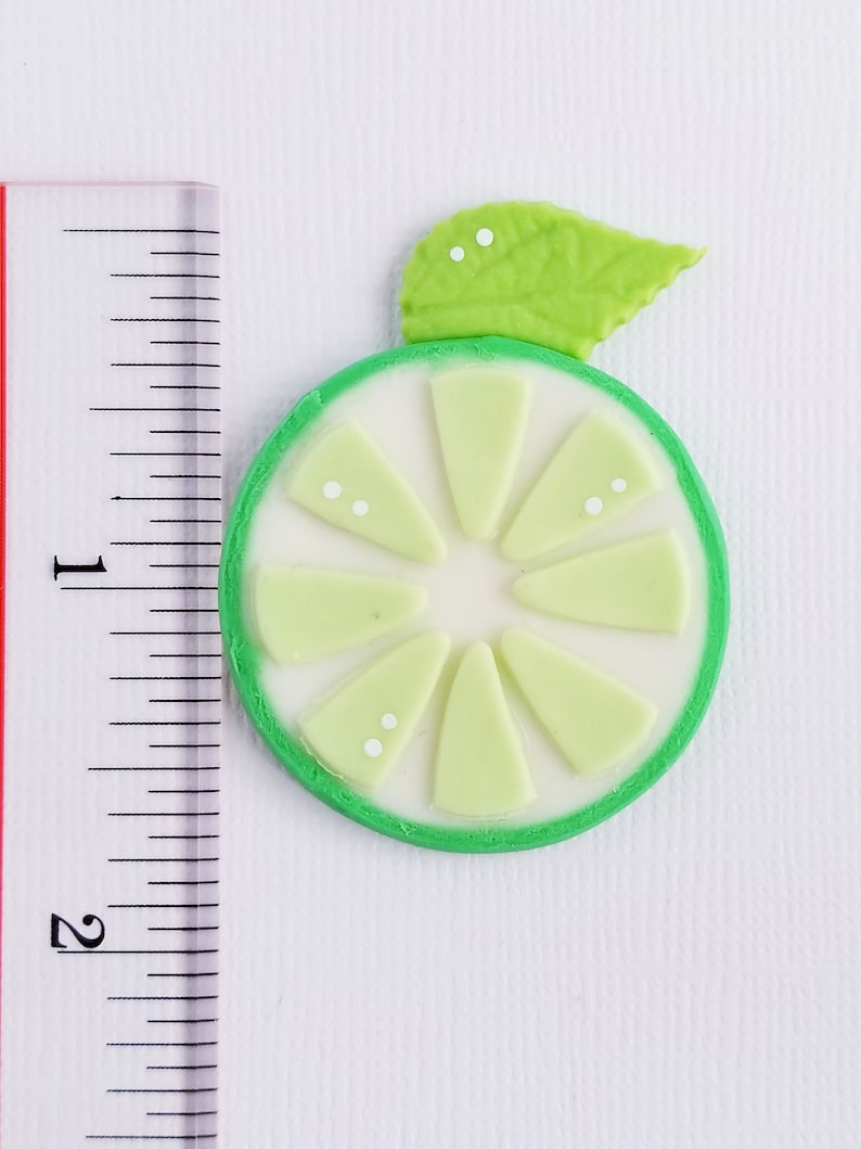 S002-D16 Lime \u2013 Charm \u2013 Bow center \u2013 Scrapbooking \u2013 Bow embellishment \u2013 Magnet
