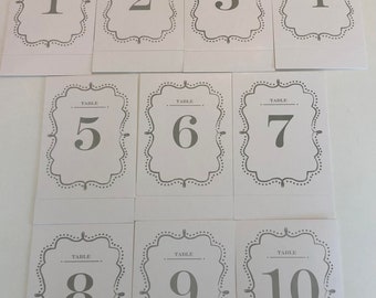 Numéros de table- Coloris gris et blanc