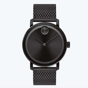 May include: A black watch with a black mesh strap and a round black face. The watch has a simple design with two hands and a small dot at the 12 o'clock position.