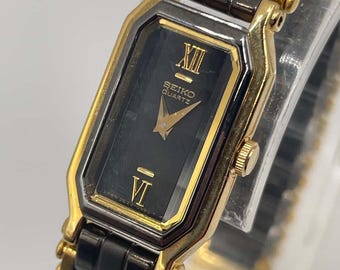 Mens Gold Tone Seiko 7N00-5C70 White Roman Tank Statement