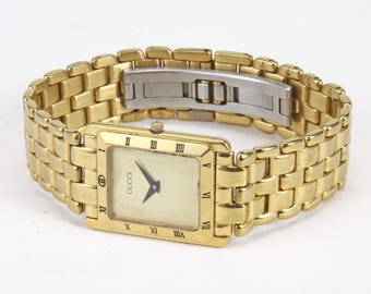 Mens Gold Tone Seiko 7N00-5C70 White Roman Tank Statement