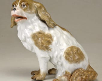 A 20th Century Meissen Porcelain Model of a Sitting Dog in White