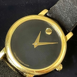 Classic Lady&#39;s Movado  87 E4 0834 Museum Watch with Gold Bezel Black Dial - Fresh Battery