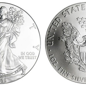 K&ouml;nnte beinhalten: Eine silberne American Eagle M&uuml;nze mit einer Darstellung von Lady Liberty auf der Vorderseite und einem Adler mit einem Schild auf der R&uuml;ckseite. Die M&uuml;nze ist mit 2009 datiert und tr&auml;gt die Inschriften "In God We Trust" und "United States of America, 1 oz. Fine Silver - One Dollar".