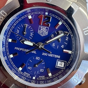 Mens Stainless TAG HEUER CN1112 Exclusive Chronograph Date Swiss Quartz Cobalt Blue Dial New Old Stock original Factory Tags, Plastic & Box