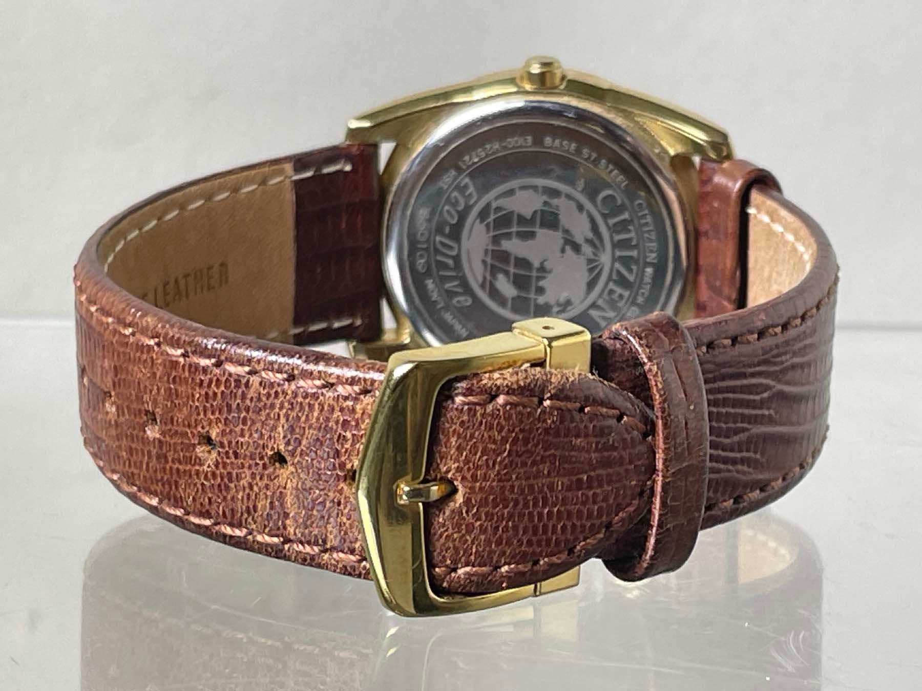 Mens Citizen Eco-drive E100-H45134-Y Wristwatch With Brown Leather