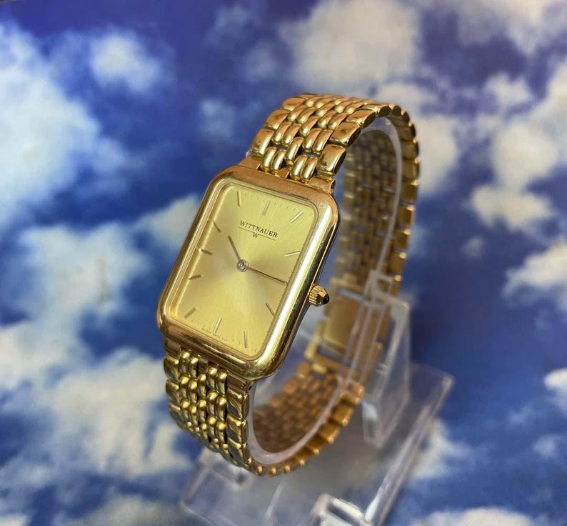 Ultra Thin Mens Gold Tone Stainless Steel Wittnauer Champagne Stick Dial Statement Watch Grain of Rice Band