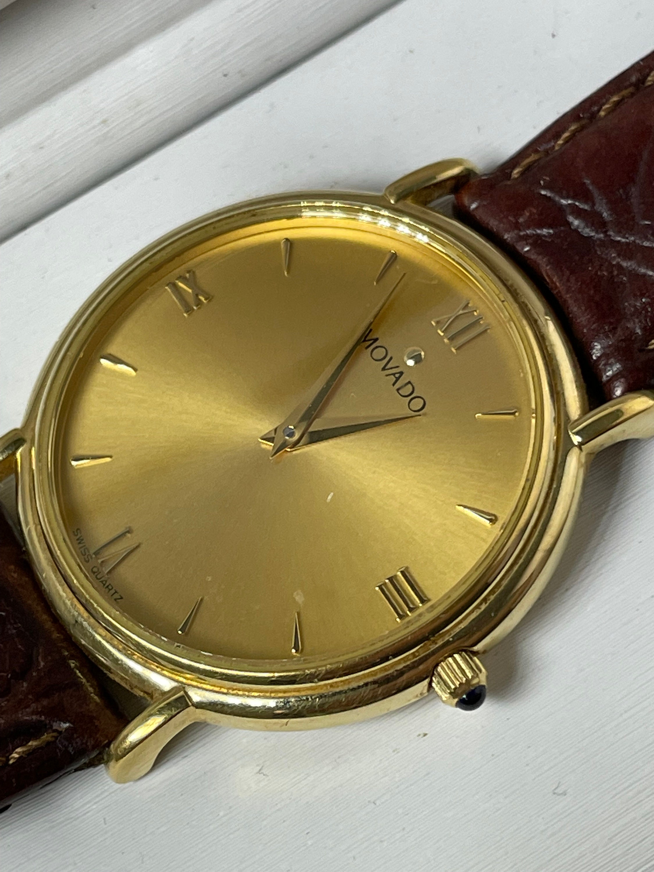 Mens Gold Tone Movado 87E40885 Roman Numeral Dauphine Hand