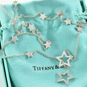 Collier lariat étoile en argent sterling Tiffany & Co avec boîte, pochette, ruban et carte d'entretien