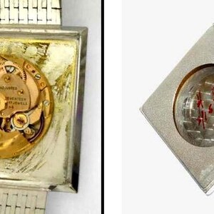May include: A silver square watch with a silver metal band. The back of the watch is open, revealing the gold-colored inner workings of the watch. The watch is on a white background.