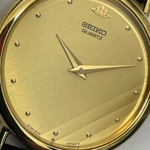 Nice Woman&#39;s Seiko Quartz Statement Watch 5Y30-6110 Asymmetric  Modern Streak Dial Quartz Thin Watch Gold Tone Champagne Dial