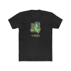 May include: Black t-shirt with a green and blue illustration of the Virgo zodiac sign in a brown square with the word "VIRGO" in gold lettering below.