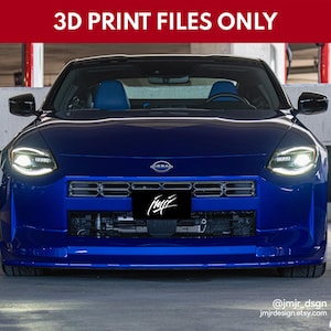 May include: A front view of a blue sports car with bright headlights. The car has a black license plate with white text. The text "3D PRINT FILES ONLY" is at the top of the image.