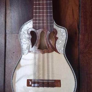 Charango - Genuine high quality 1 piece hand carved Andean stringed folk instrument - (comes with case, shoulder strap, strings & book)