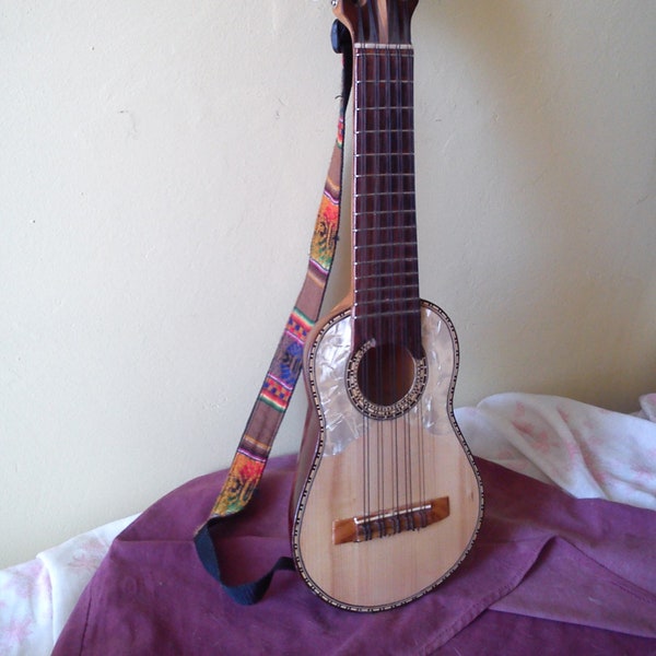 Charango - Genuine high quality 1 piece hand carved Andean stringed folk instrument - (comes with case, shoulder strap, strings & book)