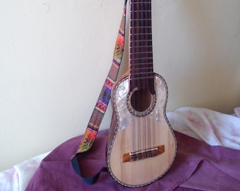 Charango - Genuine high quality 1 piece hand carved Andean stringed folk instrument - (comes with case, shoulder strap, strings & book)