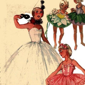 May include: Three girls wearing different ballerina costumes. The girl in the centre is wearing a white tutu and holding a pair of black maracas. The girl on the left is wearing a green and yellow flower-shaped tutu. The girl on the right is wearing a pink tutu.