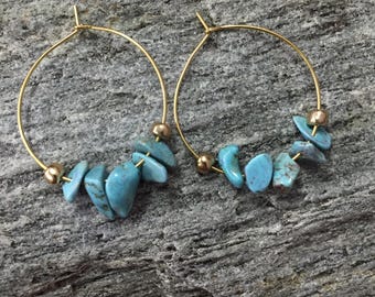 blue stone chips beads beaded on gold metal hoop earrings with gold metal bead accents