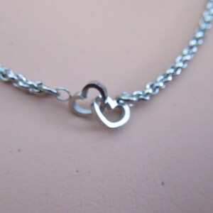 stainless steel dainty connected intertwined double hearts mother daughter sisters minimalist symbolic necklace jewelry unisex nonbinary