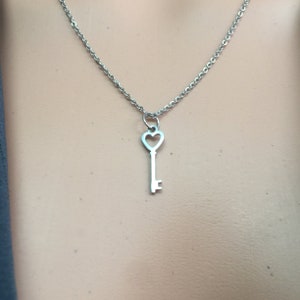 stainless steel Key charm dainty Goddess symbolic trendy fashion accessory minimalist unisex nonbinary necklace keyholder queen diva punk