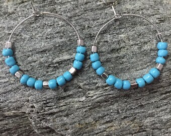 light sky blue southwest inspired beads on silver metal hoop earrings with silver metal bead accents