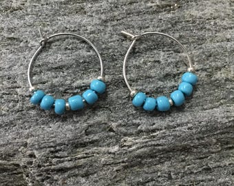 light sky blue southwest inspired beads on silver metal hoop earrings with silver metal bead accents