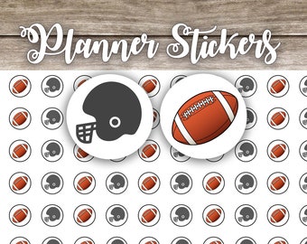 May include: A sheet of white planner stickers with a repeating pattern of black football helmets and brown footballs in white circles. The text "Planner Stickers" is at the top of the sheet.