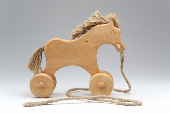 wooden horse on wheels