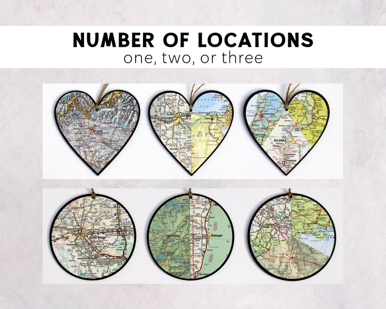 May include: Six ornaments featuring maps of different locations. Three are heart-shaped and three are round. The ornaments are black with a gold string. The text on the image reads "NUMBER OF LOCATIONS one, two, or three".