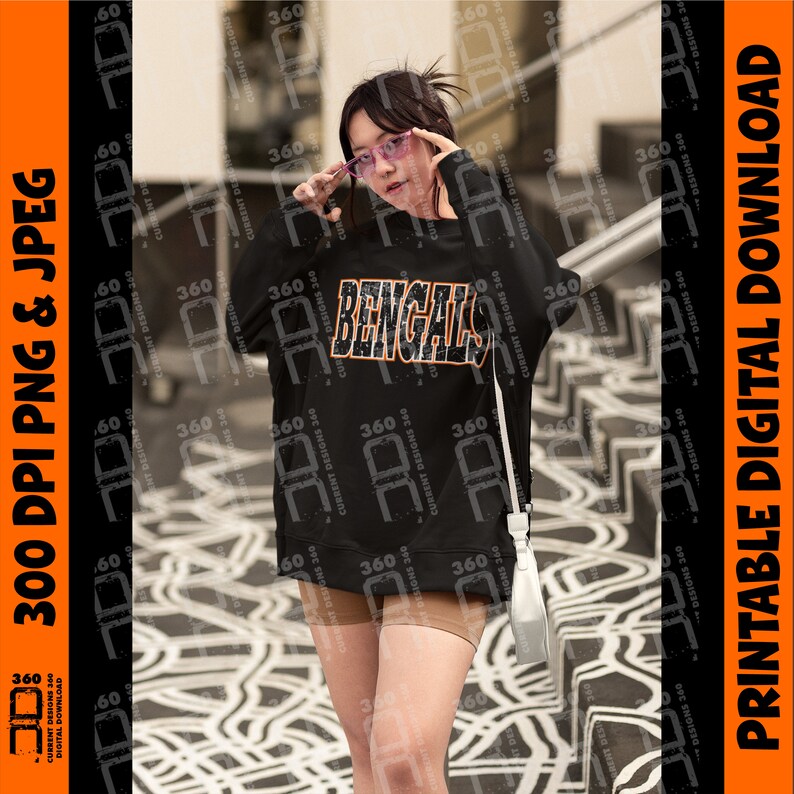 Puede incluir: Sudadera negra con la palabra "BENGALS" en letras naranjas y blancas. La imagen tambi&eacute;n incluye el texto "300 DPI PNG & JPEG" y "PRINTABLE DIGITAL DOWNLOAD" en naranja y blanco.