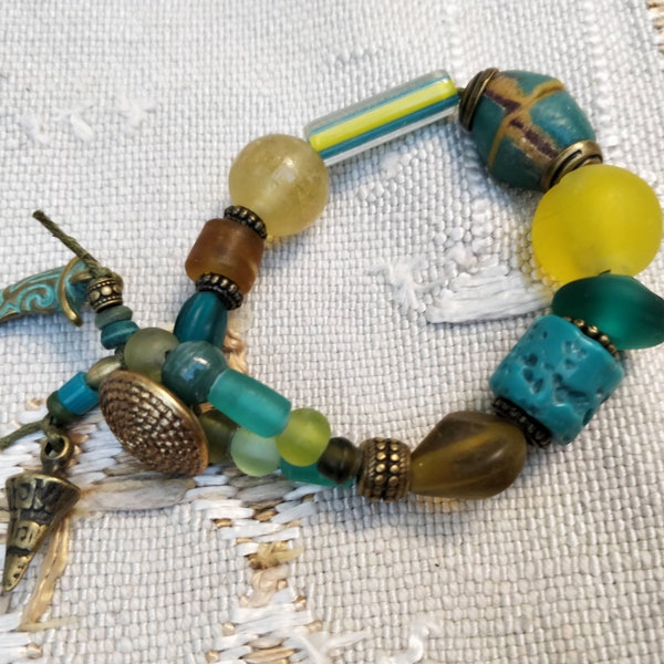 Boho bracelet, ethnic, rustic, trade beads, Tibet beads, Murano pearls, green-yellow, 1 row, button closure, ethnic jewelry,unic creation