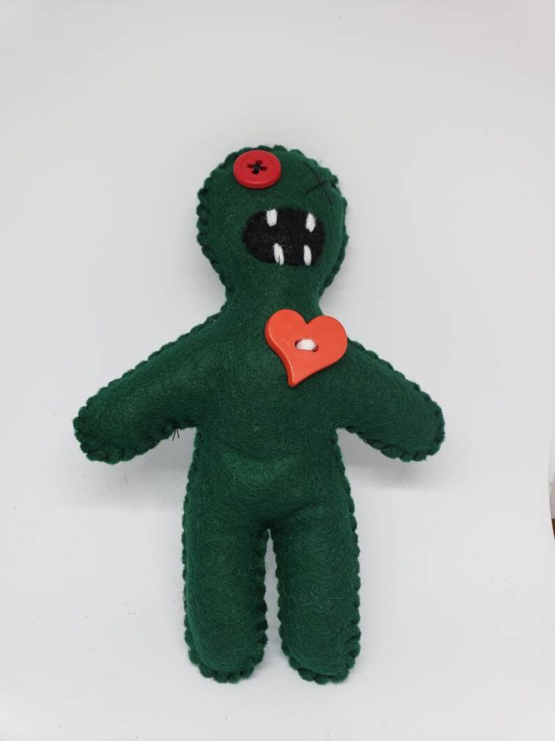 green voodoo doll
