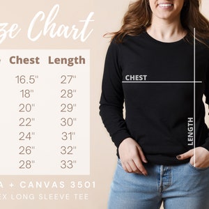 K&ouml;nnte beinhalten: Schwarzes Langarmshirt mit Gr&ouml;&szlig;entabelle. Die Tabelle zeigt Brust- und L&auml;ngenma&szlig;e in Zentimetern f&uuml;r die Gr&ouml;&szlig;en XS bis 3XL. Das Shirt ist ein Bella + Canvas 3501 Unisex-Langarmshirt.