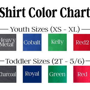 May include: Shirt color chart with color swatches for youth and toddler sizes.  The colors include Heavy Metal, Cobalt, Kelly, Red2, Charcoal, Royal, Green, and Red.