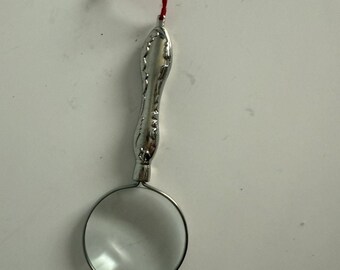 Magnifying Glass Looking Silver Tone glass Necklace Charm.