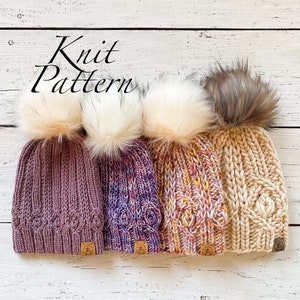May include: Four knitted hats with faux fur pom poms. The hats are in shades of purple, pink, and beige. The text "Knit Pattern" is written in white on a wooden background.