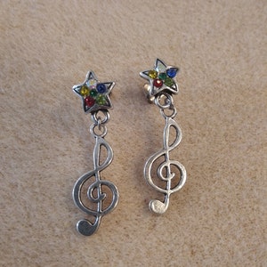 Silver nail earrings star rhinestones with floor key charm