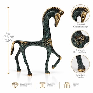 May include: A bronze-coloured horse figurine with a dark green patina, featuring floral and geometric engravings. The sculpture stands 17.5 cm tall and includes circular insets highlighting the detailed craftsmanship and bronze finish.