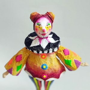 Fosforito, shines in the darkness. Cartapesta and air dry clay sculpture.