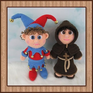 May include: Two handmade crochet dolls: a jester and a monk. The jester doll wears a blue and red outfit with gold bells, a matching hat, and brown yarn hair. The monk doll is dressed in a brown robe with a hood and a cross pendant.