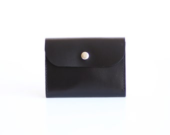 Minimalist handmade leather wallet envelope shape with snap button and coin compartment