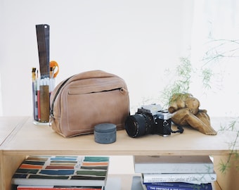 Veggie tanned camel brown leather dopp kit with front pocket