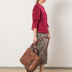 Handmade oversize leather handbag with two front pockets and long adjustable strap in brown veggie tanned leather image 5