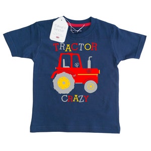 May include: A navy blue t-shirt with a red tractor graphic and the text "TRACTOR CRAZY".