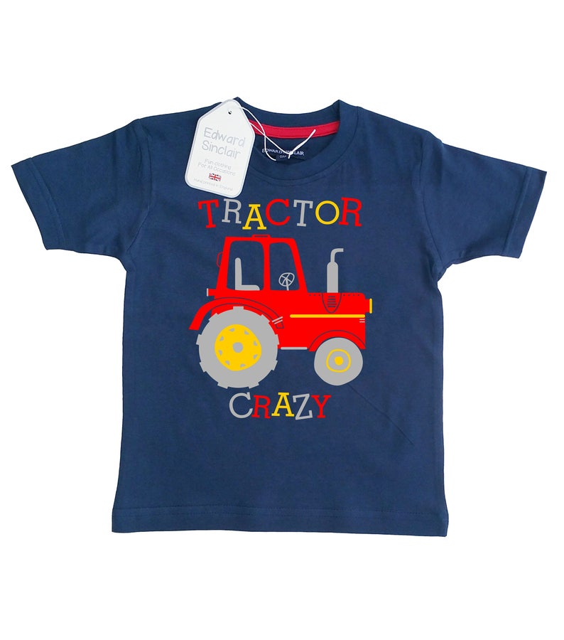 May include: A navy blue t-shirt with a red tractor graphic and the text "TRACTOR CRAZY".