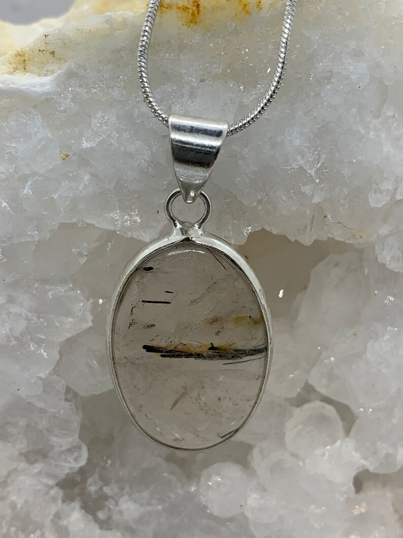 Rutilated Quartz Pendant set in sterling silver