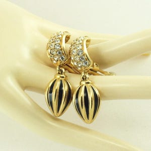 Signed SWAROVSKI 1980s Crystal Ribbed Black Drop Dangle GT Clip Earrings; Disaster Relief